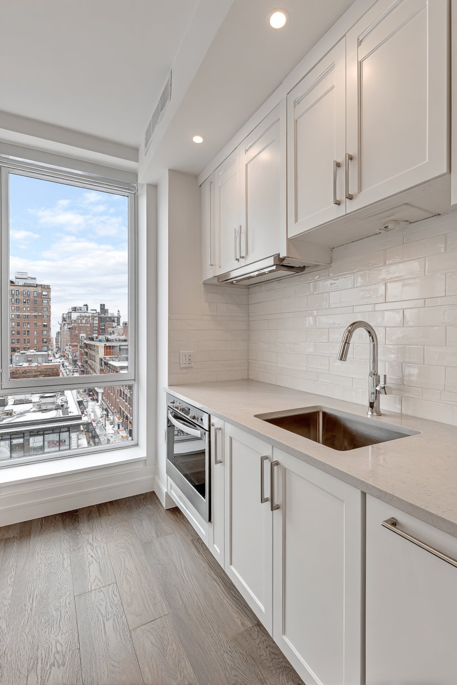 Classic White Galley Kitchen with Ceiling-Height Storage