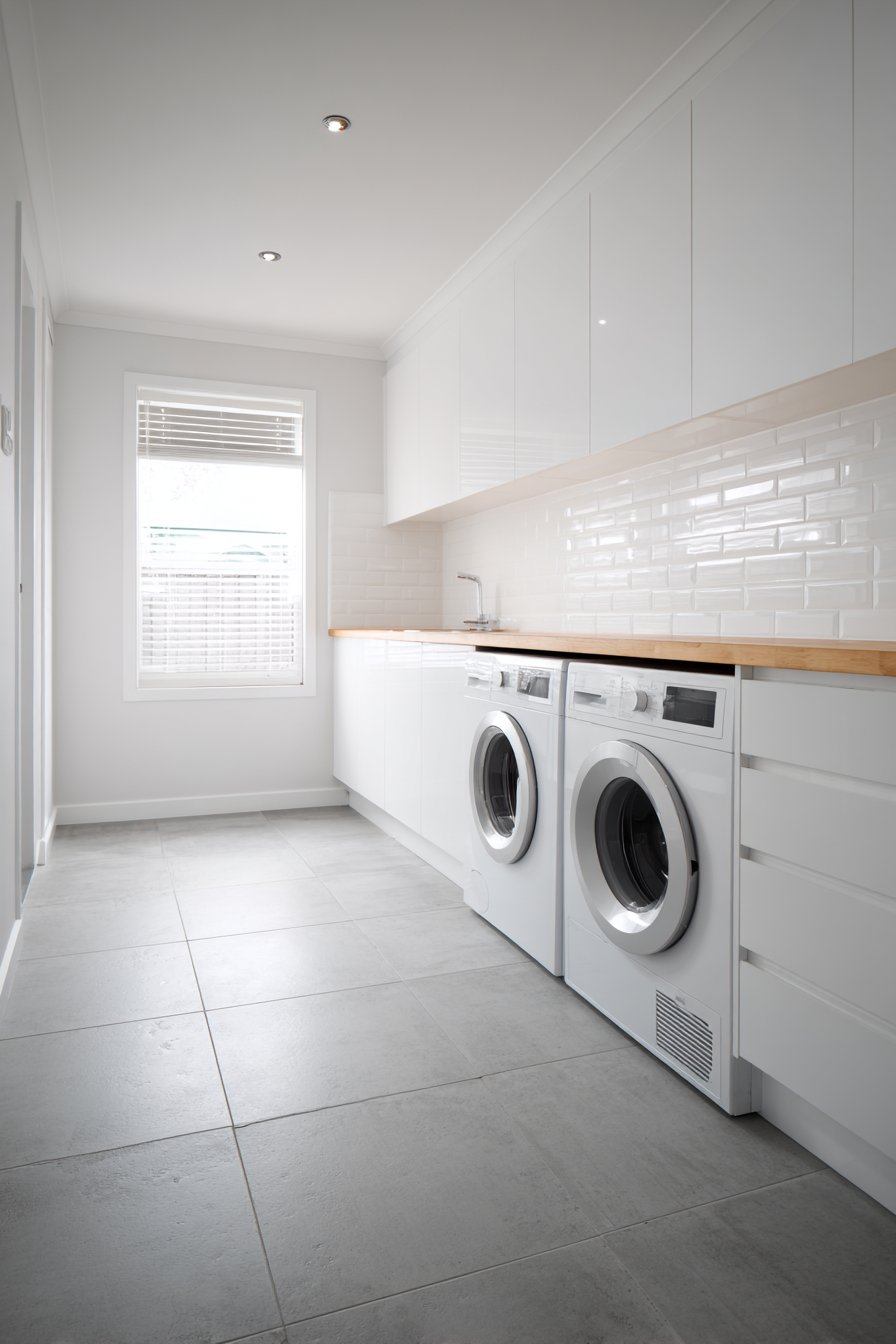 Sleek White Cabinet Haven with Floating Oak Counter