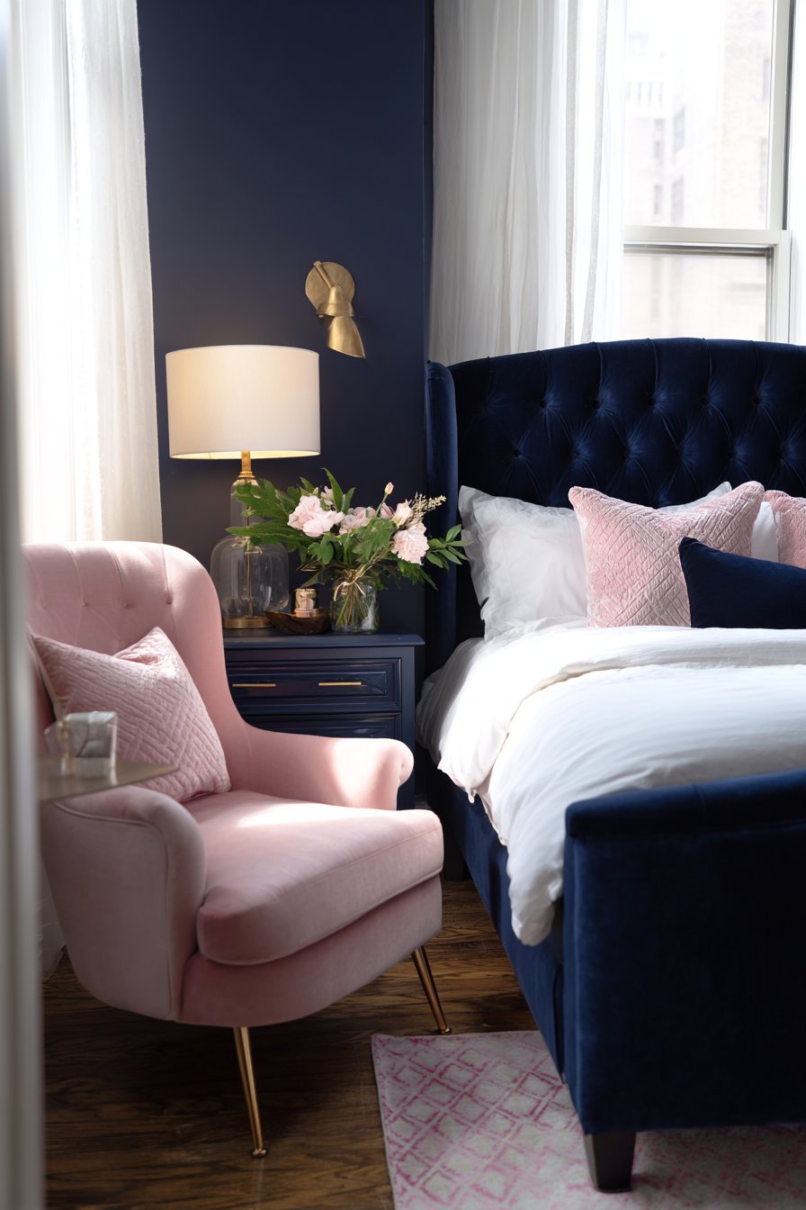 Blush Pink Upholstered Bed with Navy Accent Wall