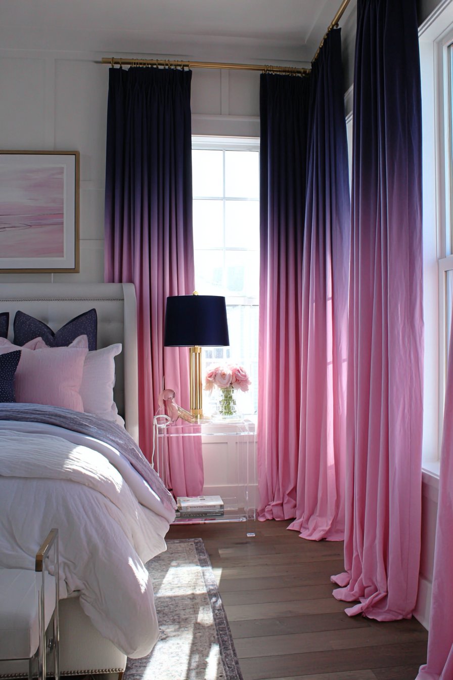 Navy Paneled Accent Wall with Pink Bedding