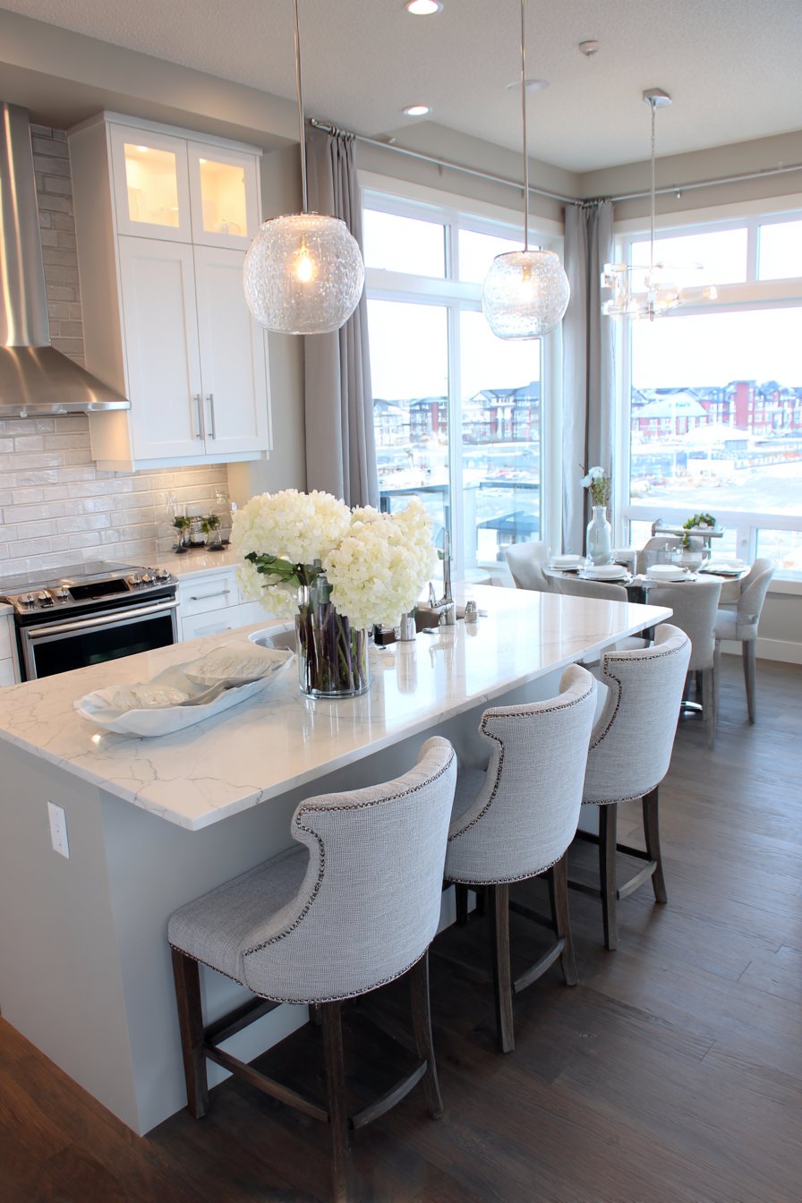 Open-Concept Grey and White Kitchen with Living Space Connection