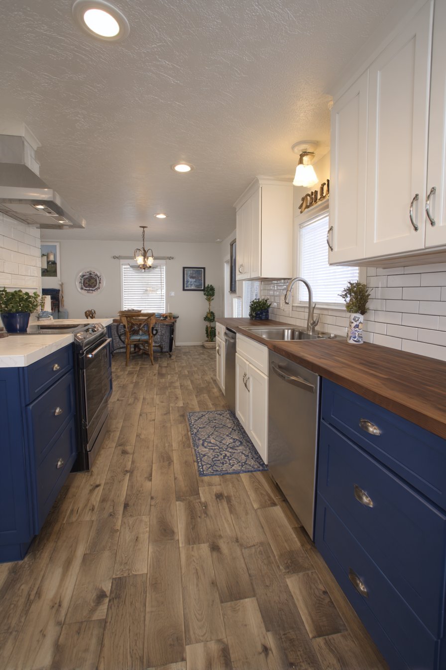 Navy and White Galley Kitchen with Family Room Flow