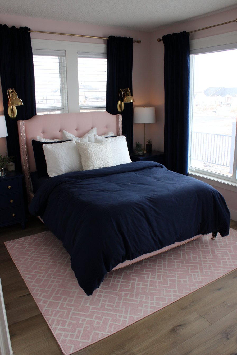 Pink Velvet Armchair Reading Nook with Navy Bookshelf