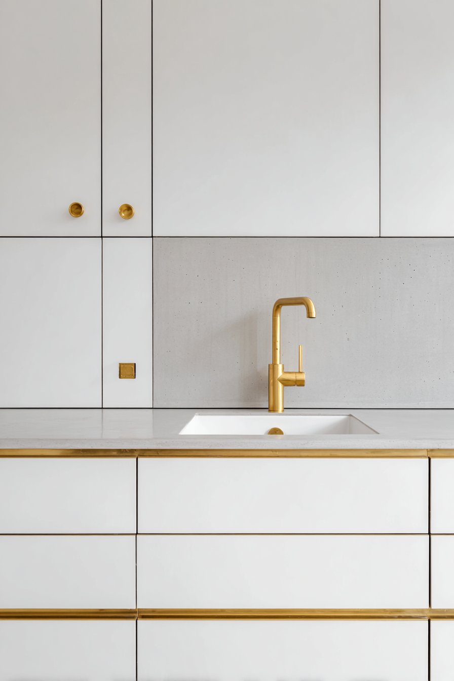 Minimalist White and Gold Kitchen
