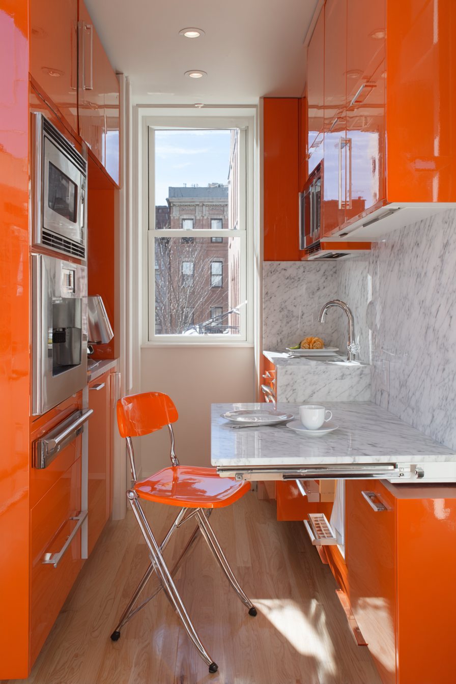 Compact Urban Orange Storage Kitchen